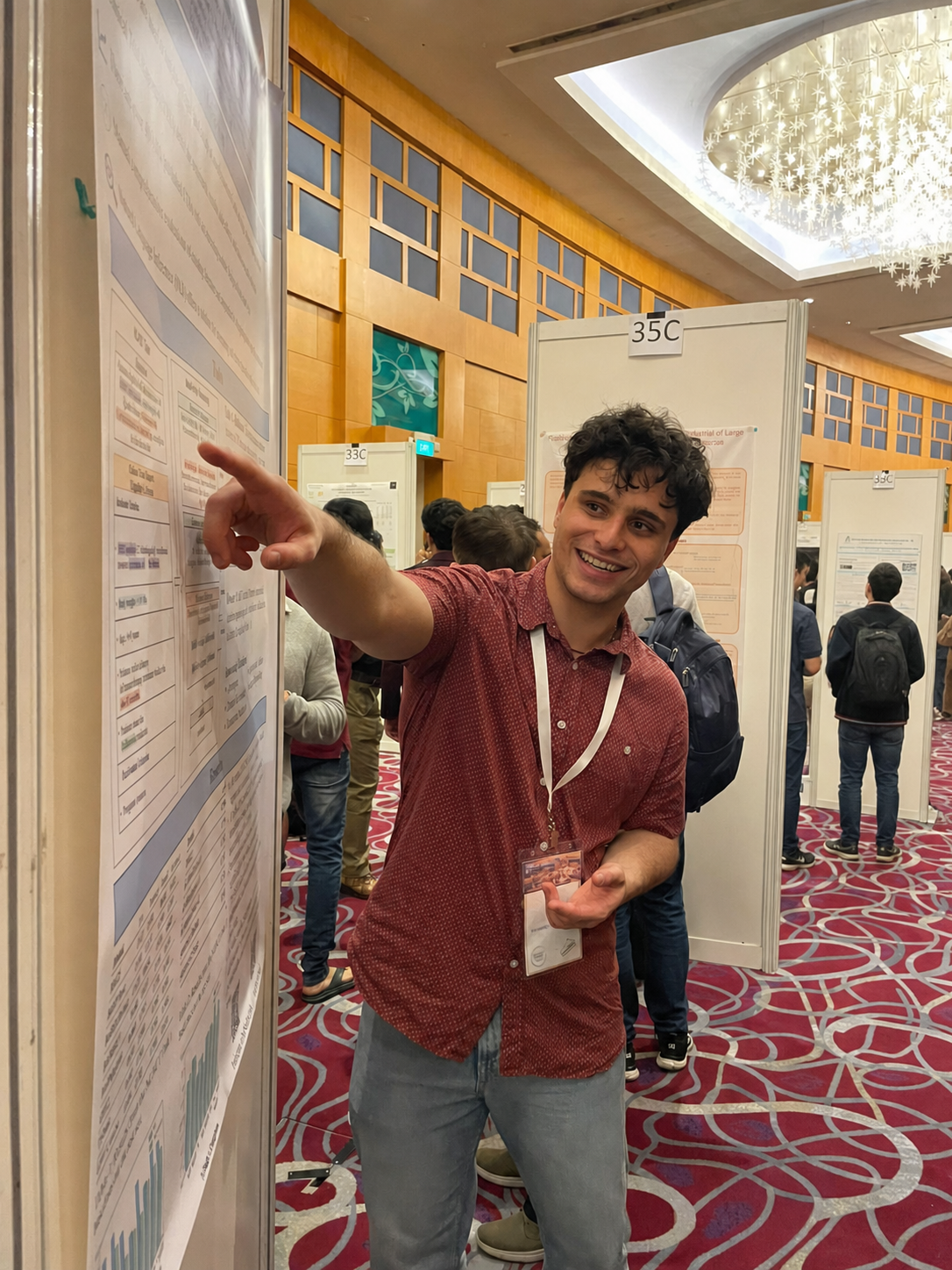 Maël Jullien presenting research at a conference poster session